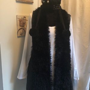 Sleeveless Faux Fur Sweater with Metallic Trim.